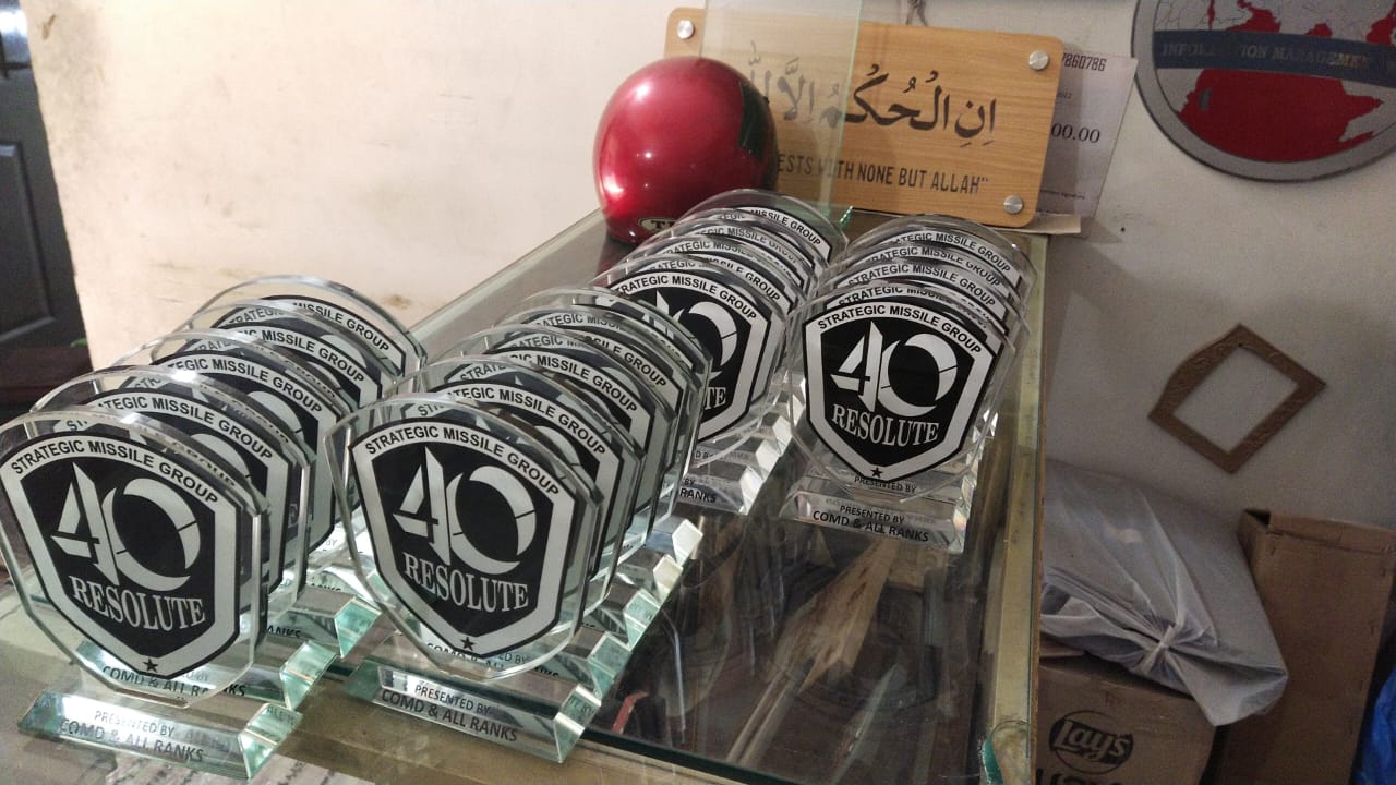 High-quality glass trophies custom-designed for the 40 Resolute Strategic Missile Group, presented by COMD & All Ranks.